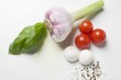 Garlic, tomatoes, mozzarella, spices, oil and basil