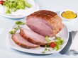 Cooked ham with mustard and salad