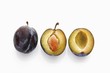 One whole and one halved damson (overhead view)