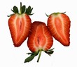 Three strawberries halves (overhead view)