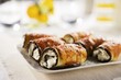 Eggplant and Ricotta Cheese Rolls on a Platter
