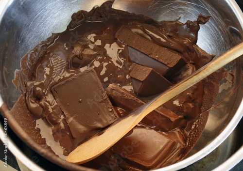 Photo: Melting chocolate couverture over bain-marie Melting chocolate couverture over bain-marie