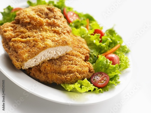 Photo: Breaded chicken breast with salad Breaded chicken breast with salad