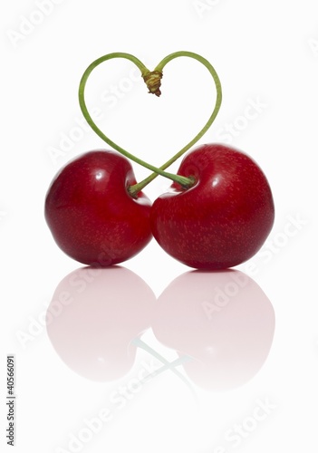 Photo: Pair of cherries forming a heart Pair of cherries forming a heart