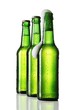 Three bottles of beer, one opened