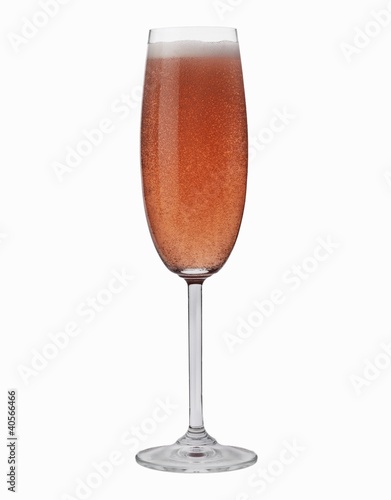 Photo: A glass of rosé sparkling wine A glass of rosé sparkling wine