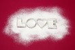 Biscuits cutters for 'LOVE' biscuits on icing sugar