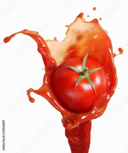 Photo: Tomato on ketchup splash Tomato on ketchup splash