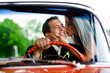 A bride kissing her groom