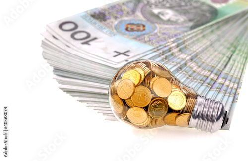 Foto: Great idea and glass bulb with many golden coins Great idea and glass bulb with many golden coins