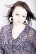 Portrait of young beautiful girl with flowing hair
