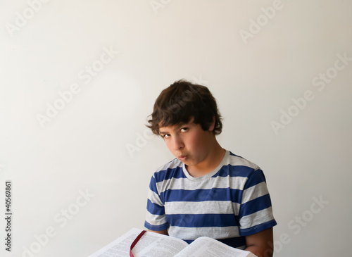 Photo: Teen boy studying bible Teen boy studying bible