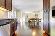 Photo: Dining room and kitchen in bright modern home. Dining room and kitchen in bright modern home.