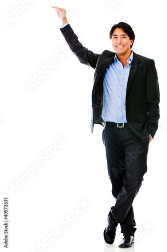 Photo: Business man with hand on something Business man with hand on something