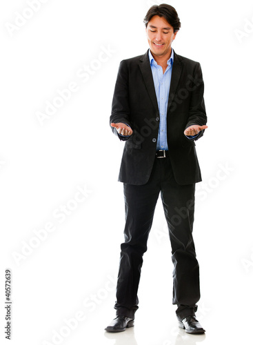 Photo: Business man holding something Business man holding something