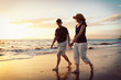 Senior Couple Enjoying Sunset at the Beach