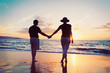 Senior Couple Enjoying Sunset at the Beach