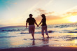 Senior Couple Enjoying Sunset at the Beach