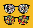 Retro sunglasses with strange monsters reflection in it.