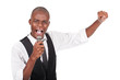 man holding a microphone and singing
