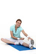 friendly blonde doing stretching exercises