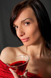 Young woman with wine in glass Young woman with wine in glass