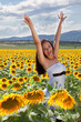 Happy woman in sunflower field Happy woman in sunflower field