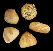 five different buns over black background