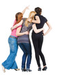 Back view of group beautiful women pointing at wall. Girl friend