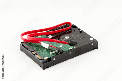 Photo: hard disk and cord isolate hard disk and cord isolate