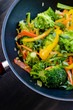 Photo: colorful stir fry in a wok colorful stir fry in a wok