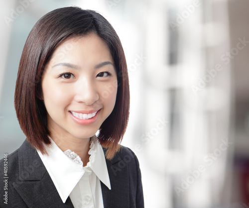 Photo: Close up of beautiful business woman smile face Close up of beautiful business woman smile face