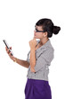 Thoughtful woman with iPad tablet