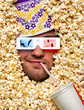 Photo: Face in popcorn watching 3D movie Face in popcorn watching 3D movie