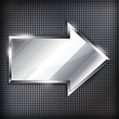 Arrow sign on a metal background.