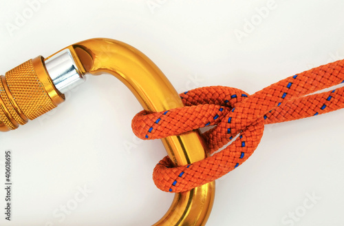 Photo: Climbing equipment - carabiner and knot Climbing equipment - carabiner and knot