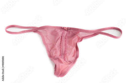 Photo: Woman's sexy and pink thong on white background Woman's sexy and pink thong on white background