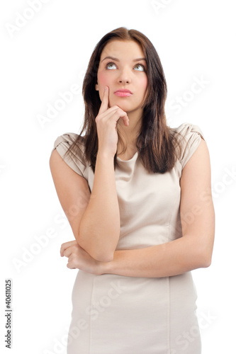 Photo: Pensive woman looking up Pensive woman looking up
