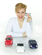 Woman shows her driver licence and her dream cars