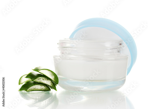 Photo: Aloe vera and cream isolated on white Aloe vera and cream isolated on white