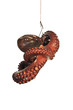 Funny scene with a hooked and boiled octopus on white