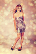 Photo: woman in silver dress woman in silver dress
