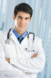 Portrait of happy doctor at office