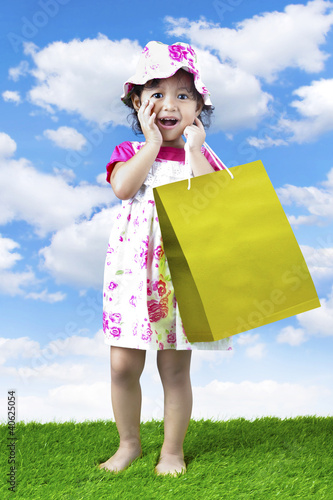 Photo: Little shopping girl Little shopping girl