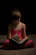 Little Girl Reading A Book