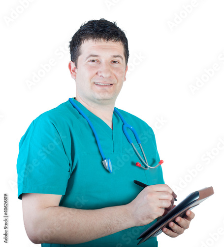 Photo: Male nurse taking notes Male nurse taking notes