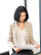 calm woman with documents
