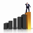 Businessman on Top of financial charts