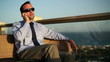 Businessman on the phone, outdoors