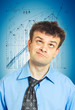 A portrait of a young comic businessman lost in thoughts